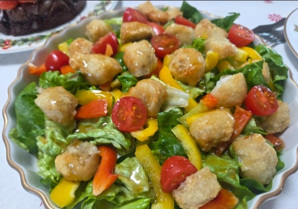 Boneless Fried Monkfish Salad with Cherry Tomatoes and Romaine.